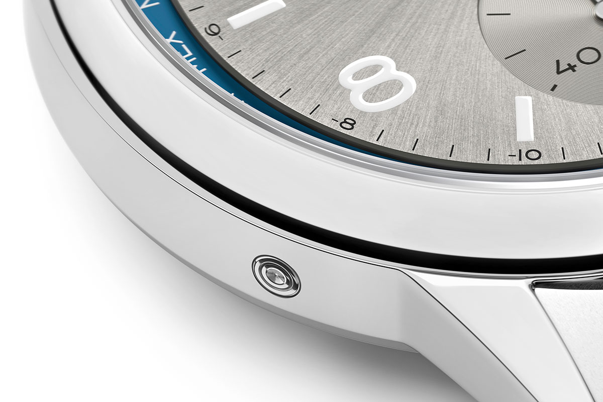 The recessed pusher at 8 o'clock on the Nomos Club Sport neomatik Worldtimer